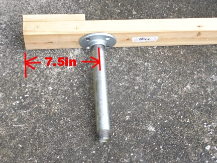 Attaching a floor flange and 10 inch nipple to the bottom of the head
